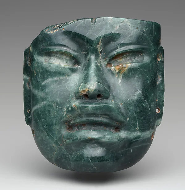 Olmec jadeite mask with a broad finished surface