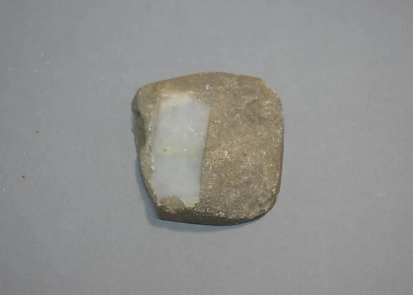 Burmese jadeite specimen with irregular shape and color zones